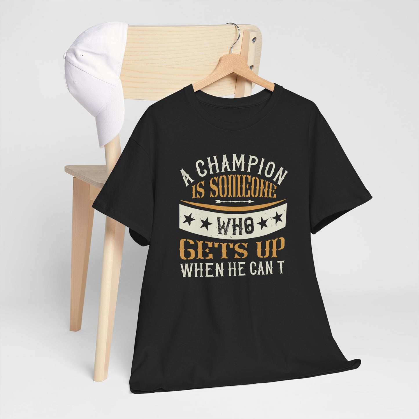 A champion is someone who gets up when he can't Unisex Heavy Cotton Tee