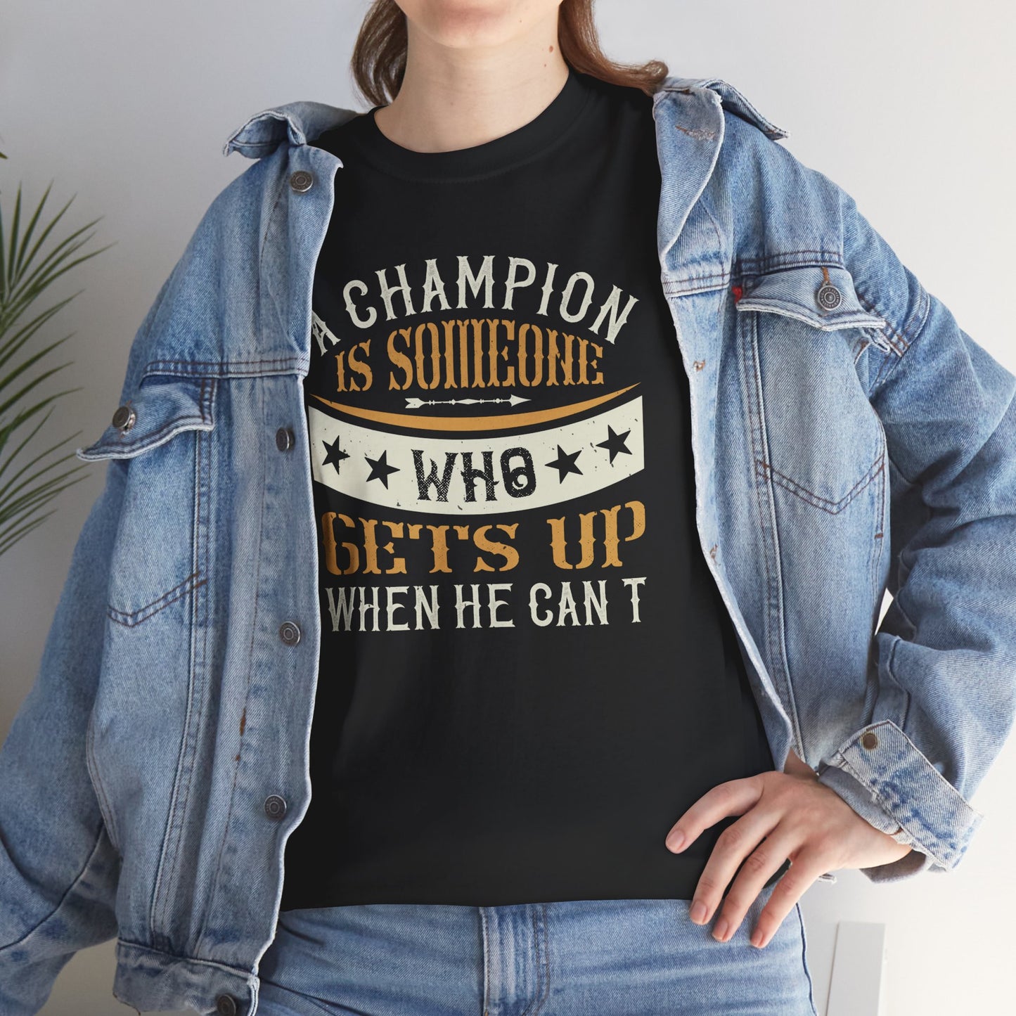 A champion is someone who gets up when he can't Unisex Heavy Cotton Tee